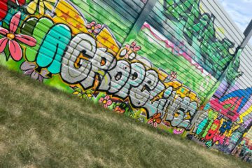 Eine Wand mit einem Grafiti, auf dem "Gröpelingen" geschrieben steht